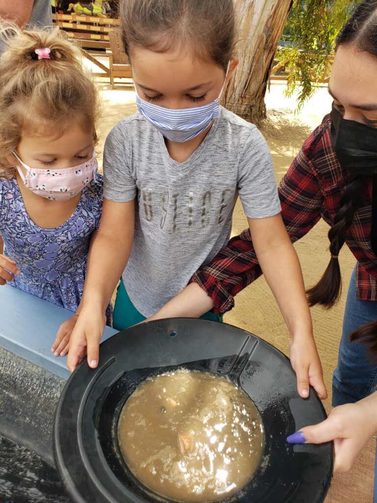 2 little girls Panning for Treasure at El Dorado Frontier
