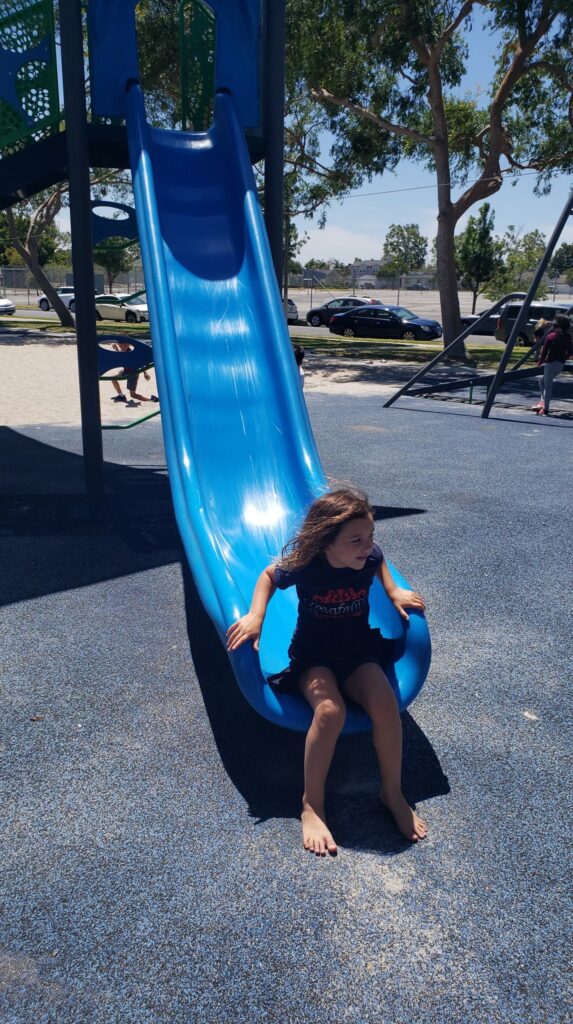 little girl on slide