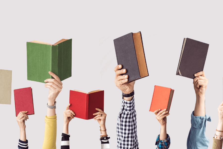 people holding books