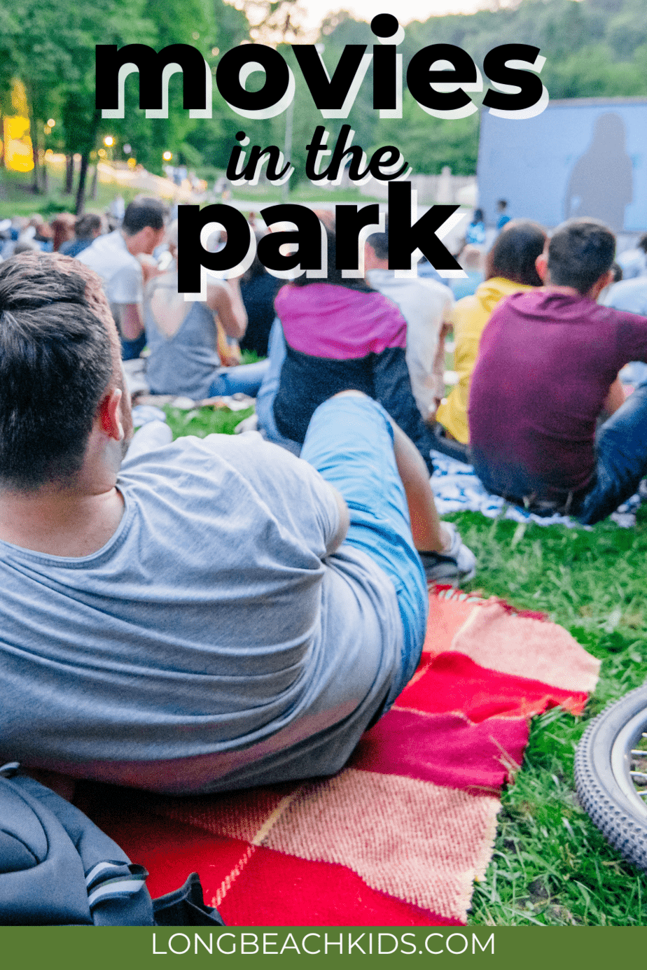 people at a movie in the park; text: movies in the park